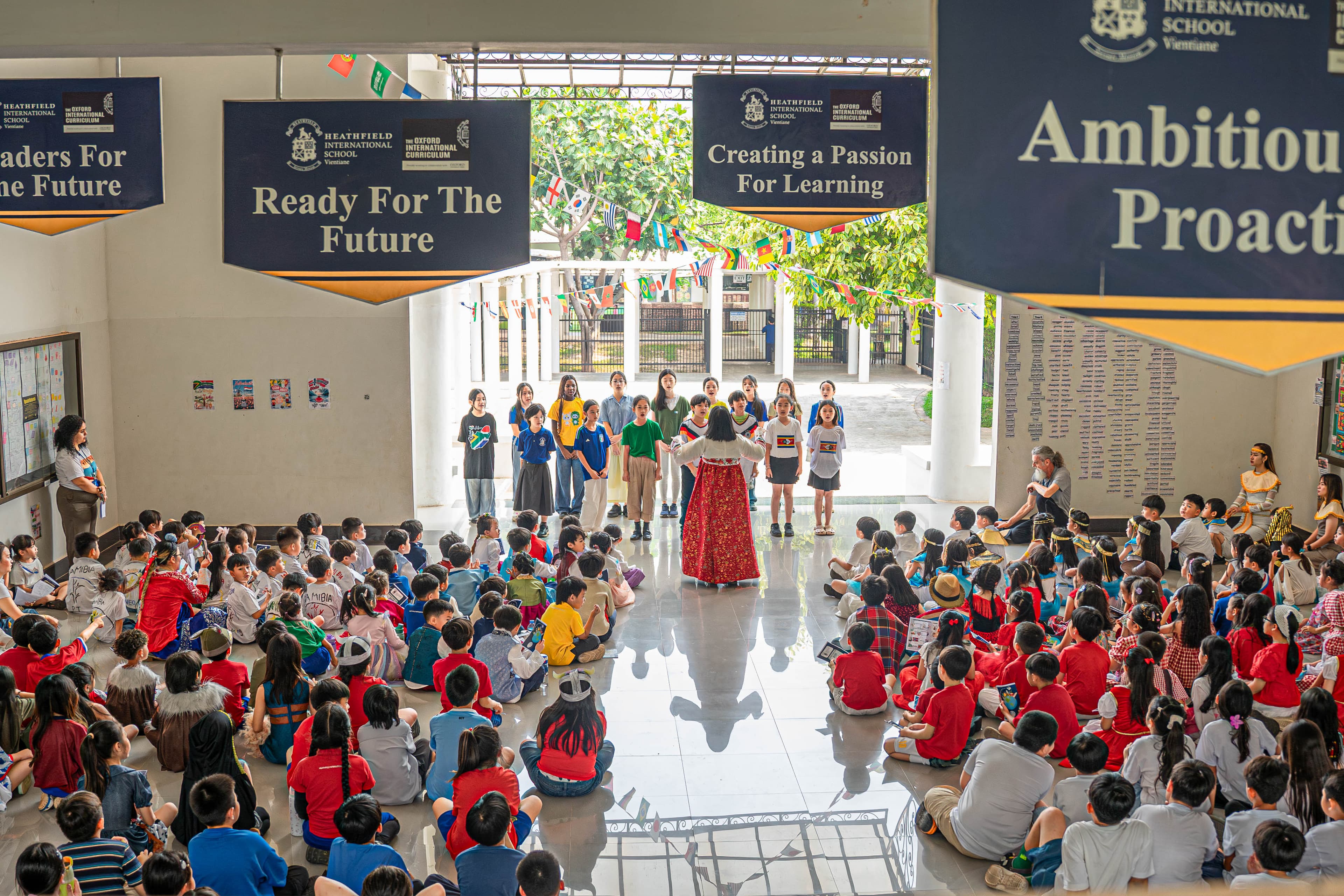 Teacher interacting with students in a classroom